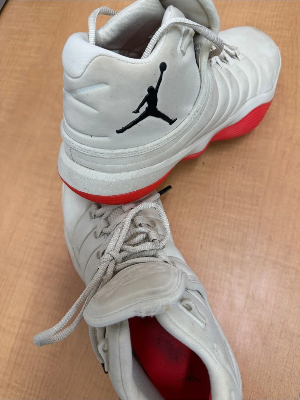 Jordan Men’s White Athletic Shoes with Red Interior